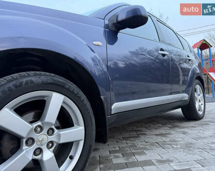 Синий Мицубиси Аутлендер, объемом двигателя 2 л и пробегом 228 тыс. км за 8888 $, фото 18 на Automoto.ua