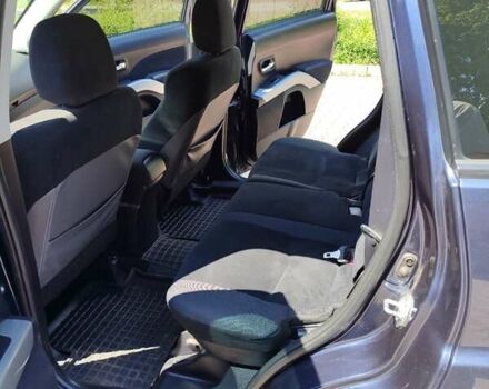 Синий Мицубиси Аутлендер, объемом двигателя 1.97 л и пробегом 196 тыс. км за 8950 $, фото 21 на Automoto.ua