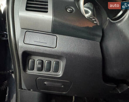 Синий Мицубиси Аутлендер, объемом двигателя 2 л и пробегом 228 тыс. км за 7999 $, фото 25 на Automoto.ua