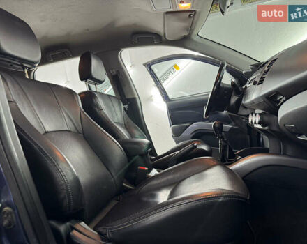 Синий Мицубиси Аутлендер, объемом двигателя 2 л и пробегом 228 тыс. км за 7999 $, фото 28 на Automoto.ua