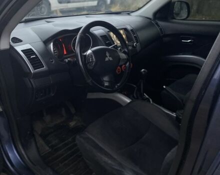 Синий Мицубиси Аутлендер, объемом двигателя 2.4 л и пробегом 250 тыс. км за 6300 $, фото 11 на Automoto.ua