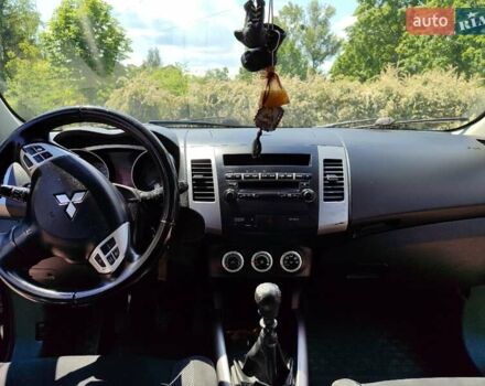 Синий Мицубиси Аутлендер, объемом двигателя 1.97 л и пробегом 196 тыс. км за 8950 $, фото 19 на Automoto.ua