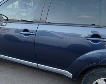 Синий Мицубиси Аутлендер, объемом двигателя 1.97 л и пробегом 196 тыс. км за 8950 $, фото 3 на Automoto.ua