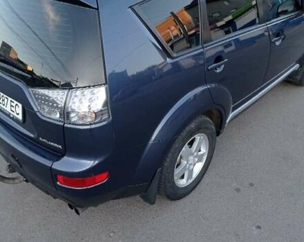 Синий Мицубиси Аутлендер, объемом двигателя 1.97 л и пробегом 196 тыс. км за 8950 $, фото 6 на Automoto.ua