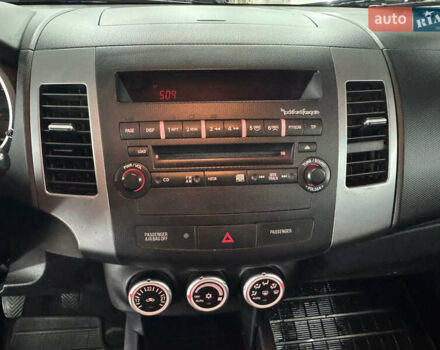 Синий Мицубиси Аутлендер, объемом двигателя 2 л и пробегом 228 тыс. км за 7999 $, фото 24 на Automoto.ua