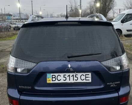 Синий Мицубиси Аутлендер, объемом двигателя 2.4 л и пробегом 250 тыс. км за 6300 $, фото 3 на Automoto.ua