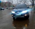 Синий Мицубиси Аутлендер, объемом двигателя 2 л и пробегом 293 тыс. км за 8300 $, фото 1 на Automoto.ua