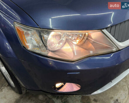 Синий Мицубиси Аутлендер, объемом двигателя 2 л и пробегом 228 тыс. км за 7999 $, фото 10 на Automoto.ua