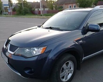 Синий Мицубиси Аутлендер, объемом двигателя 1.97 л и пробегом 196 тыс. км за 8950 $, фото 2 на Automoto.ua