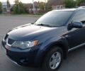 Синий Мицубиси Аутлендер, объемом двигателя 1.97 л и пробегом 196 тыс. км за 8950 $, фото 2 на Automoto.ua