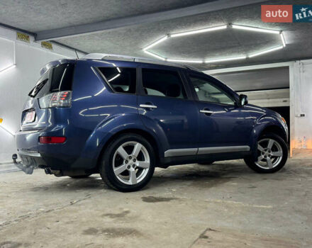 Синий Мицубиси Аутлендер, объемом двигателя 2 л и пробегом 228 тыс. км за 7999 $, фото 8 на Automoto.ua