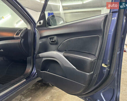 Синий Мицубиси Аутлендер, объемом двигателя 2 л и пробегом 228 тыс. км за 7999 $, фото 31 на Automoto.ua