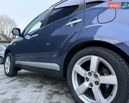 Синий Мицубиси Аутлендер, объемом двигателя 2 л и пробегом 228 тыс. км за 8888 $, фото 19 на Automoto.ua