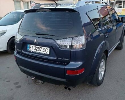 Синий Мицубиси Аутлендер, объемом двигателя 1.97 л и пробегом 196 тыс. км за 8950 $, фото 5 на Automoto.ua
