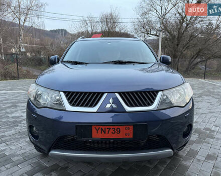 Синий Мицубиси Аутлендер, объемом двигателя 2 л и пробегом 228 тыс. км за 8888 $, фото 2 на Automoto.ua