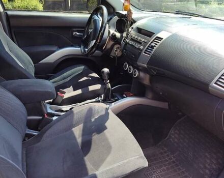 Синий Мицубиси Аутлендер, объемом двигателя 1.97 л и пробегом 196 тыс. км за 8950 $, фото 15 на Automoto.ua