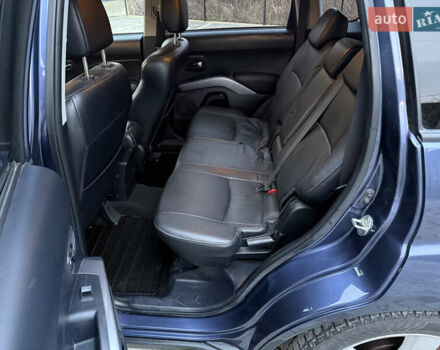 Синий Мицубиси Аутлендер, объемом двигателя 2 л и пробегом 228 тыс. км за 8888 $, фото 30 на Automoto.ua