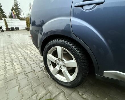 Синий Мицубиси Аутлендер, объемом двигателя 2 л и пробегом 388 тыс. км за 5000 $, фото 4 на Automoto.ua