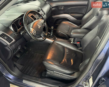 Синий Мицубиси Аутлендер, объемом двигателя 2 л и пробегом 228 тыс. км за 7999 $, фото 18 на Automoto.ua