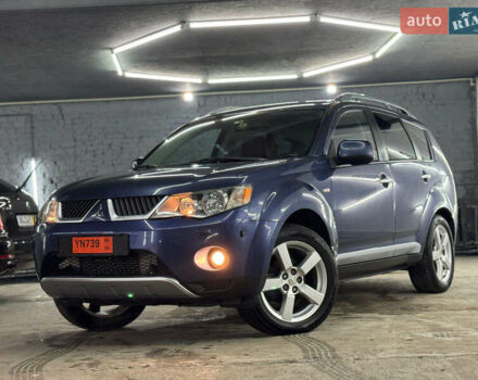 Синий Мицубиси Аутлендер, объемом двигателя 2 л и пробегом 228 тыс. км за 7999 $, фото 9 на Automoto.ua