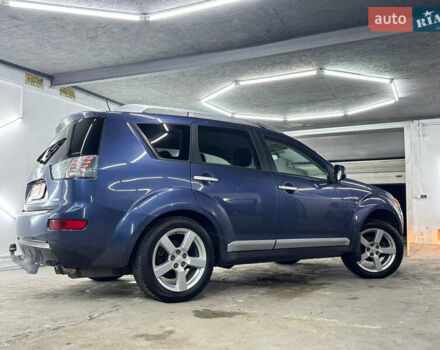 Синий Мицубиси Аутлендер, объемом двигателя 2 л и пробегом 228 тыс. км за 7999 $, фото 7 на Automoto.ua
