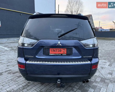 Синий Мицубиси Аутлендер, объемом двигателя 2 л и пробегом 228 тыс. км за 8888 $, фото 8 на Automoto.ua