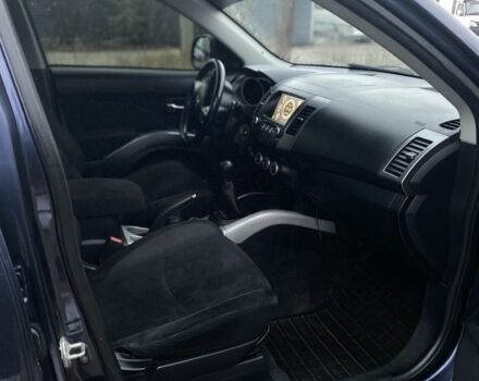 Синий Мицубиси Аутлендер, объемом двигателя 2.4 л и пробегом 250 тыс. км за 6300 $, фото 12 на Automoto.ua