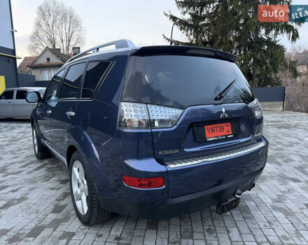 Синий Мицубиси Аутлендер, объемом двигателя 2 л и пробегом 228 тыс. км за 8888 $, фото 7 на Automoto.ua