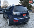 Синий Мицубиси Аутлендер, объемом двигателя 2 л и пробегом 228 тыс. км за 8888 $, фото 7 на Automoto.ua