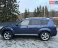 Синий Мицубиси Аутлендер, объемом двигателя 2 л и пробегом 228 тыс. км за 8888 $, фото 5 на Automoto.ua
