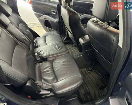 Синий Мицубиси Аутлендер, объемом двигателя 2 л и пробегом 228 тыс. км за 7999 $, фото 36 на Automoto.ua