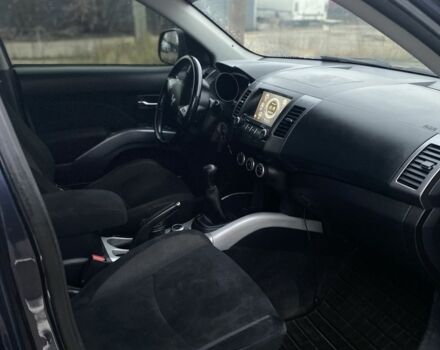 Синий Мицубиси Аутлендер, объемом двигателя 2.4 л и пробегом 250 тыс. км за 6300 $, фото 5 на Automoto.ua