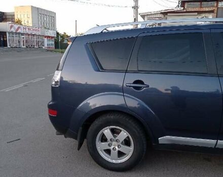 Синий Мицубиси Аутлендер, объемом двигателя 1.97 л и пробегом 196 тыс. км за 8950 $, фото 7 на Automoto.ua
