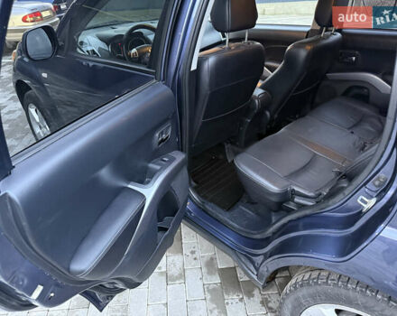 Синий Мицубиси Аутлендер, объемом двигателя 2 л и пробегом 228 тыс. км за 8888 $, фото 29 на Automoto.ua