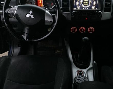 Синий Мицубиси Аутлендер, объемом двигателя 2.4 л и пробегом 250 тыс. км за 6300 $, фото 6 на Automoto.ua