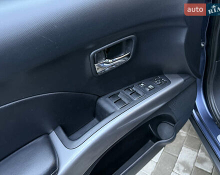 Синий Мицубиси Аутлендер, объемом двигателя 2 л и пробегом 228 тыс. км за 8888 $, фото 21 на Automoto.ua