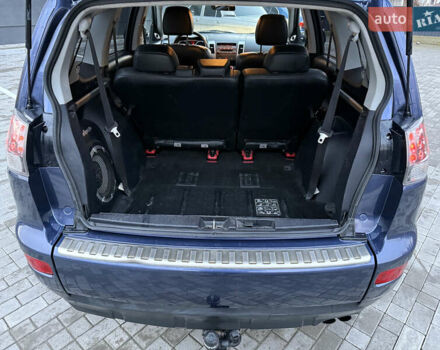 Синий Мицубиси Аутлендер, объемом двигателя 2 л и пробегом 228 тыс. км за 8888 $, фото 44 на Automoto.ua