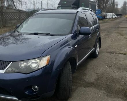 Синий Мицубиси Аутлендер, объемом двигателя 2.4 л и пробегом 250 тыс. км за 6300 $, фото 2 на Automoto.ua