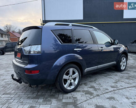 Синий Мицубиси Аутлендер, объемом двигателя 2 л и пробегом 228 тыс. км за 8888 $, фото 10 на Automoto.ua