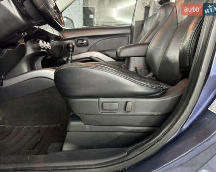 Синий Мицубиси Аутлендер, объемом двигателя 2 л и пробегом 228 тыс. км за 7999 $, фото 21 на Automoto.ua