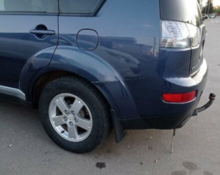 Синий Мицубиси Аутлендер, объемом двигателя 1.97 л и пробегом 196 тыс. км за 8950 $, фото 1 на Automoto.ua