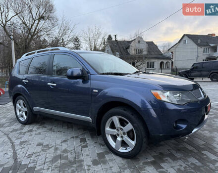 Синий Мицубиси Аутлендер, объемом двигателя 2 л и пробегом 228 тыс. км за 8888 $, фото 12 на Automoto.ua