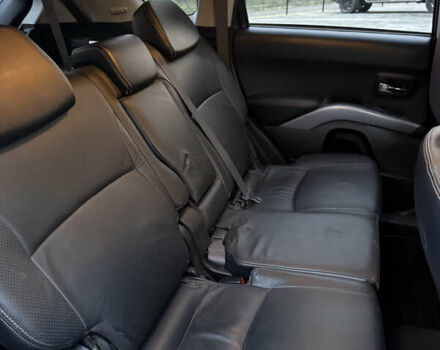 Синий Мицубиси Аутлендер, объемом двигателя 2 л и пробегом 228 тыс. км за 8888 $, фото 35 на Automoto.ua