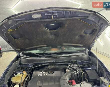 Синий Мицубиси Аутлендер, объемом двигателя 2 л и пробегом 228 тыс. км за 7999 $, фото 45 на Automoto.ua