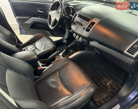 Синий Мицубиси Аутлендер, объемом двигателя 2 л и пробегом 228 тыс. км за 7999 $, фото 33 на Automoto.ua