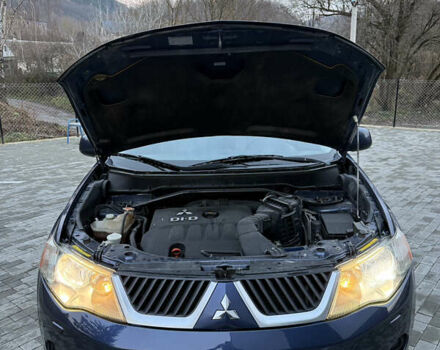 Синий Мицубиси Аутлендер, объемом двигателя 2 л и пробегом 228 тыс. км за 8888 $, фото 49 на Automoto.ua