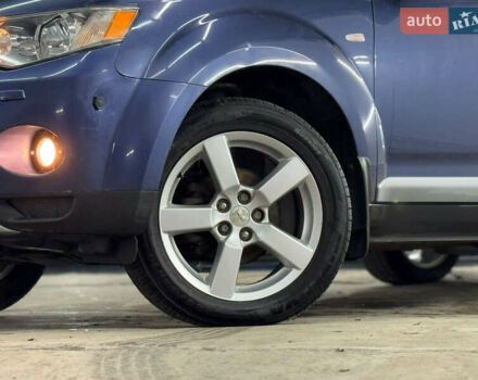 Синий Мицубиси Аутлендер, объемом двигателя 2 л и пробегом 228 тыс. км за 7999 $, фото 11 на Automoto.ua