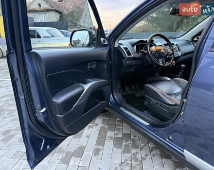 Синий Мицубиси Аутлендер, объемом двигателя 2 л и пробегом 228 тыс. км за 8888 $, фото 20 на Automoto.ua