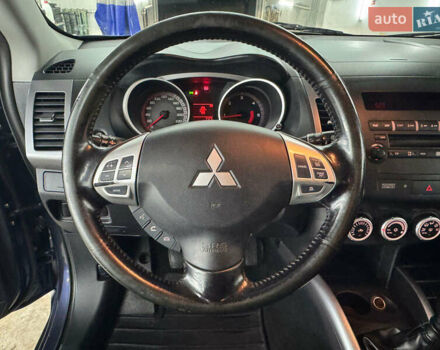 Синий Мицубиси Аутлендер, объемом двигателя 2 л и пробегом 228 тыс. км за 7999 $, фото 27 на Automoto.ua