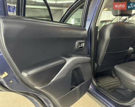 Синий Мицубиси Аутлендер, объемом двигателя 2 л и пробегом 228 тыс. км за 7999 $, фото 41 на Automoto.ua